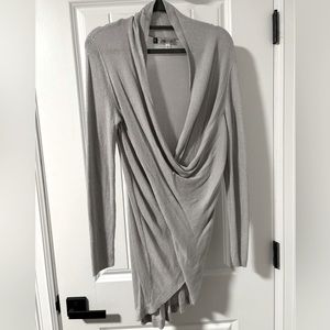 Jennifer Lopez cross over draped metallic sweater
